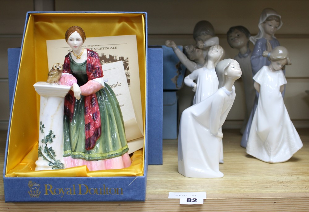 Four Lladro figures of children in their nightdresses, largest 24cm, three similar Nao figures, largest 27cm and a Royal Doulton figure